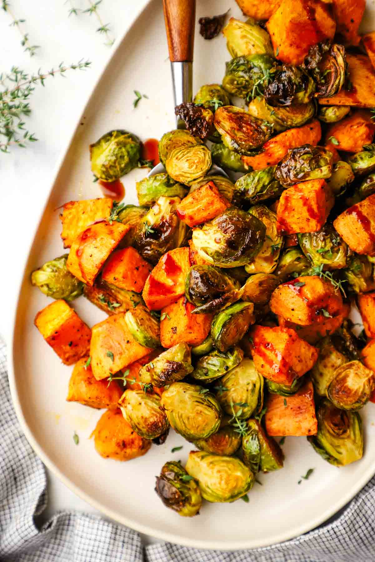 overhead view of a dish of roasted Brussels sprouts and sweet potatoes