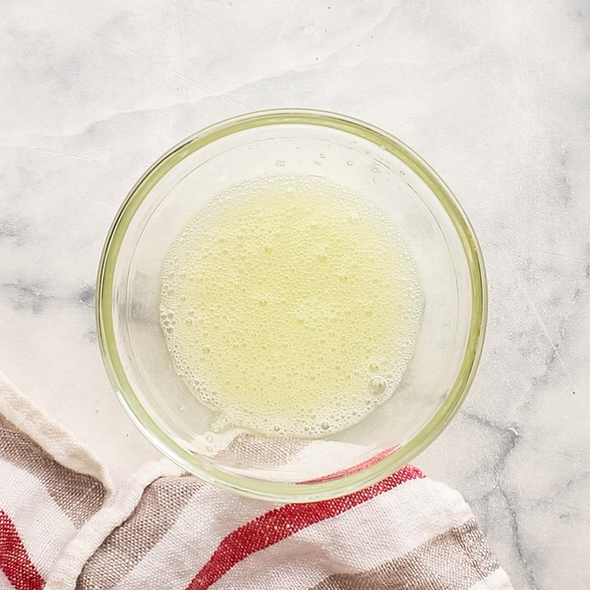 egg white whisked in a bowl