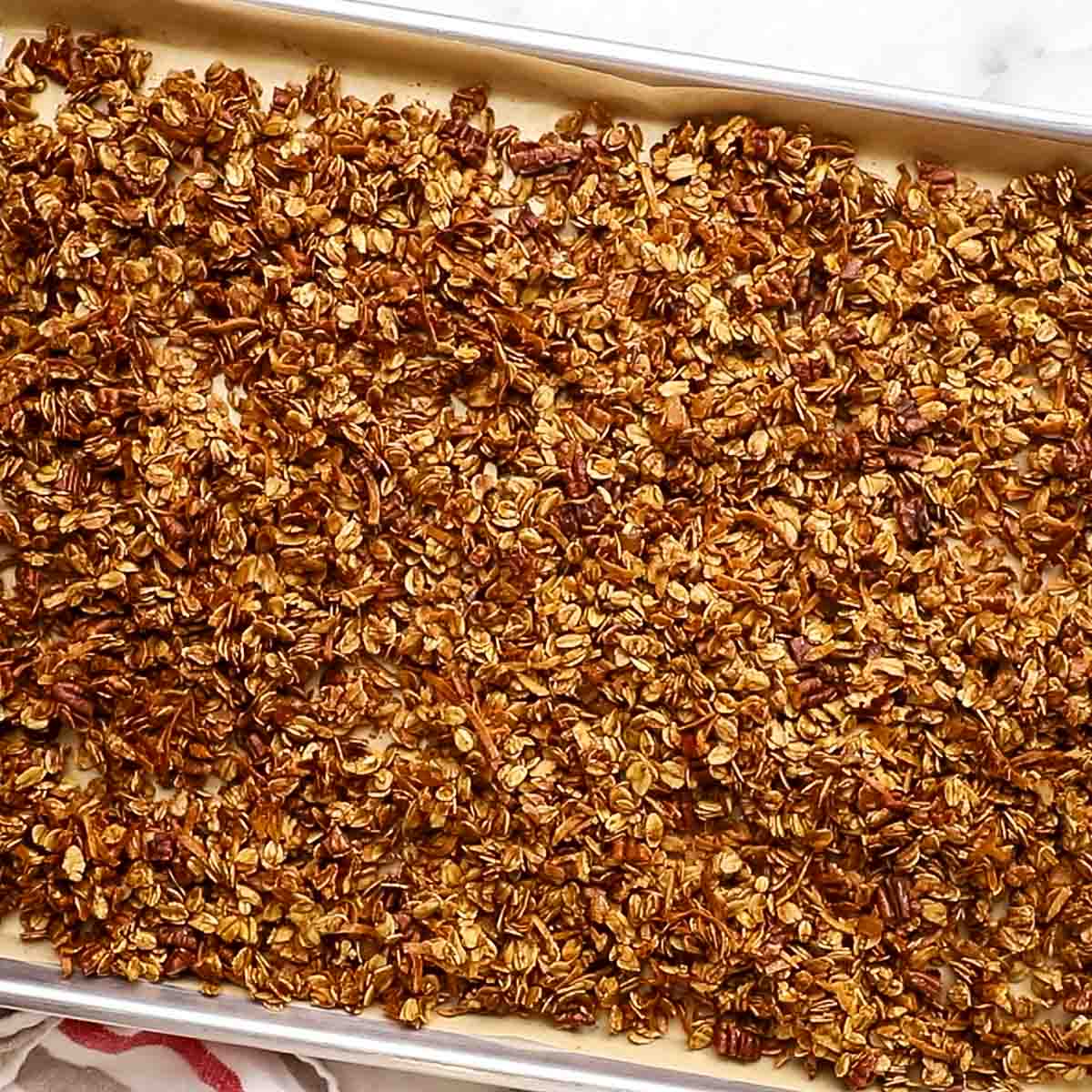 granola baked on a baking sheet