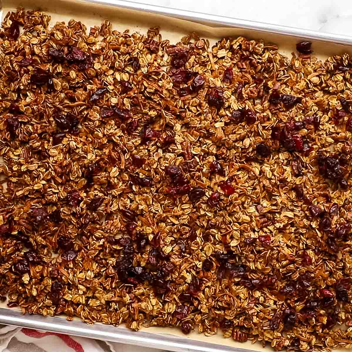 gingerbread granola in a baking sheet