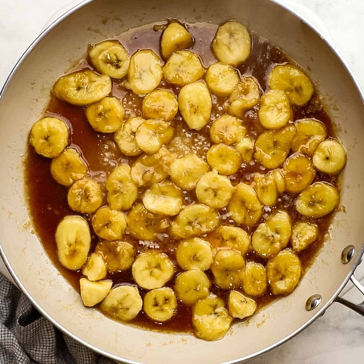 banana foster filling cooking in the pan