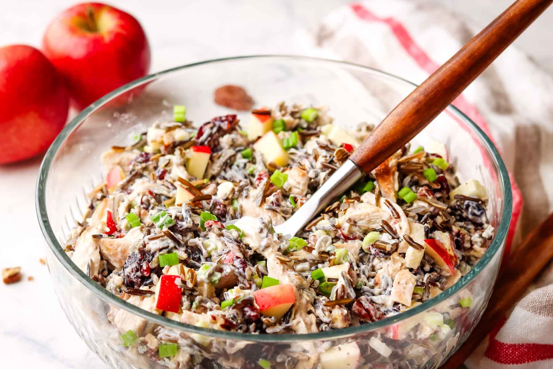 a serving bowl with chicken and wild rice salad