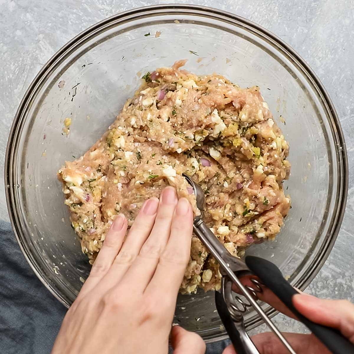 making meatballs with a scoop