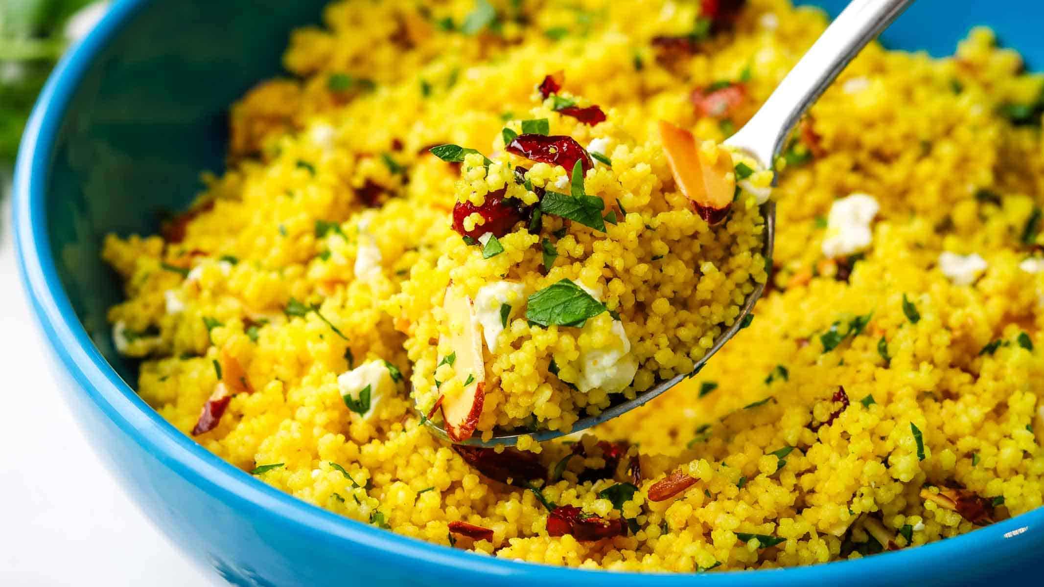 A spoonful of curried couscous salad.