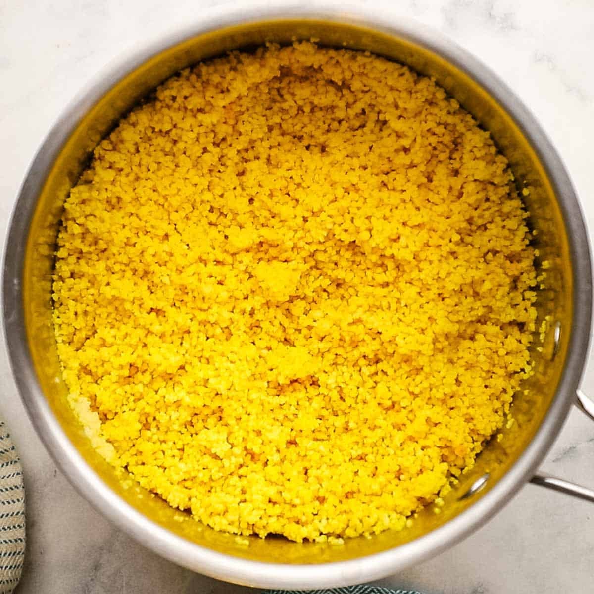 A pot of cooked couscous.