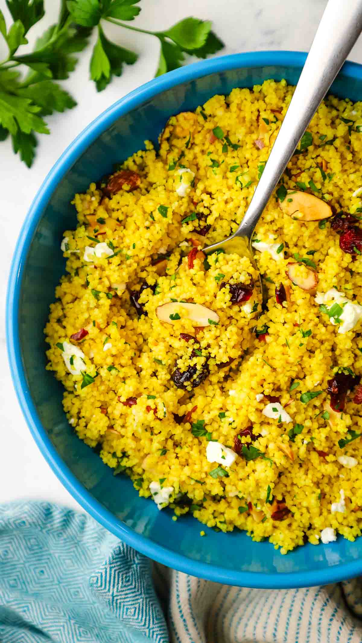 A bowl of curried couscous salad.