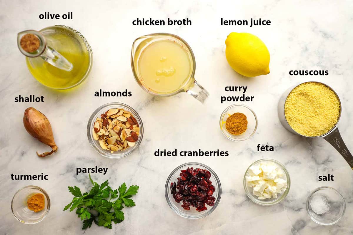 Portioned and labeled ingredients to make curried couscous salad.