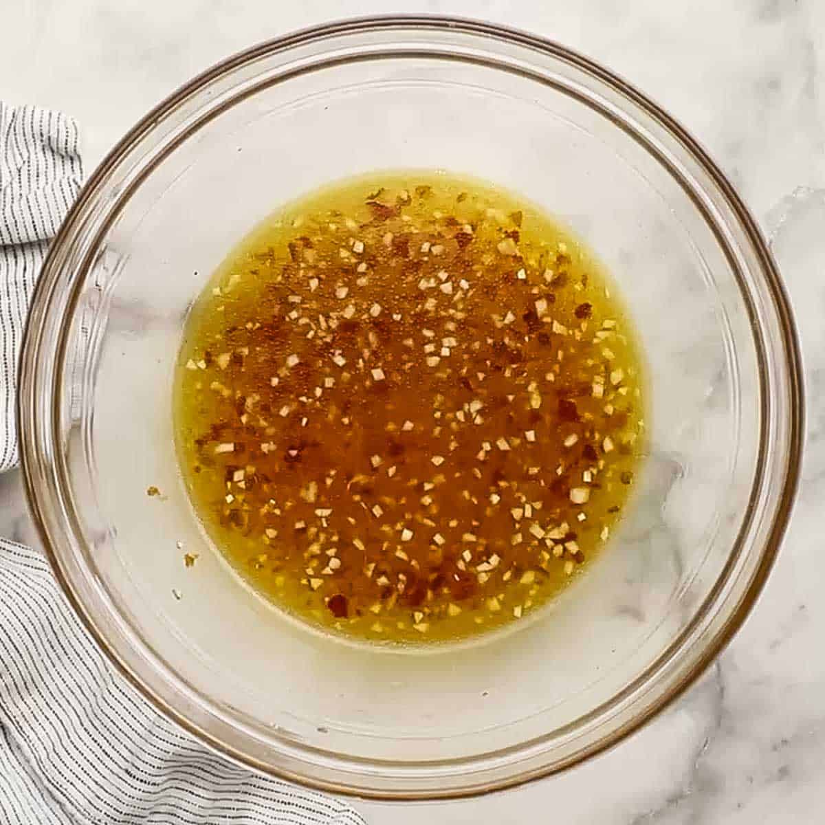 marinade for chili lime shrimp mixed in a bowl