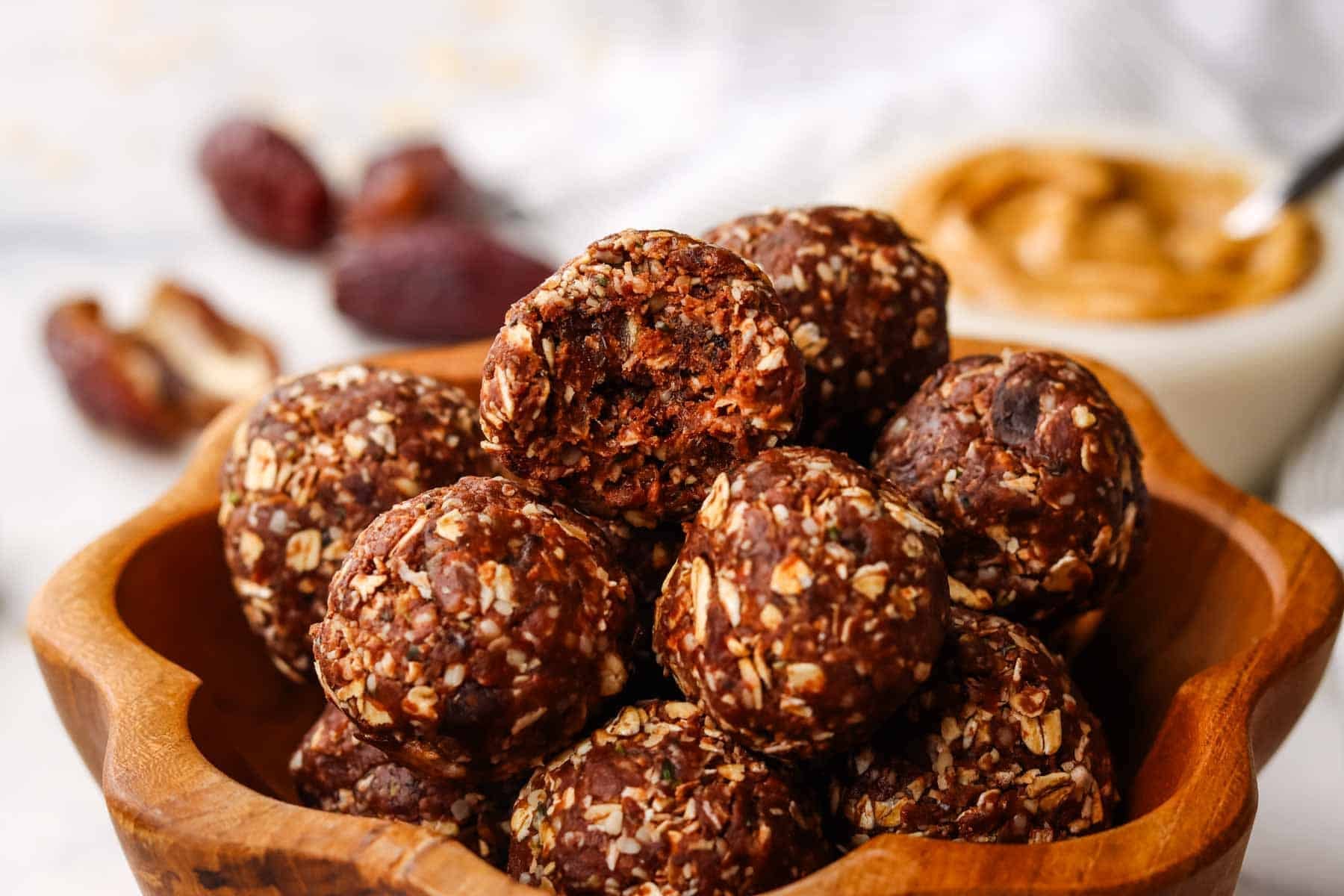 A bowl of chocolate Peanut Butter Protein Balls.