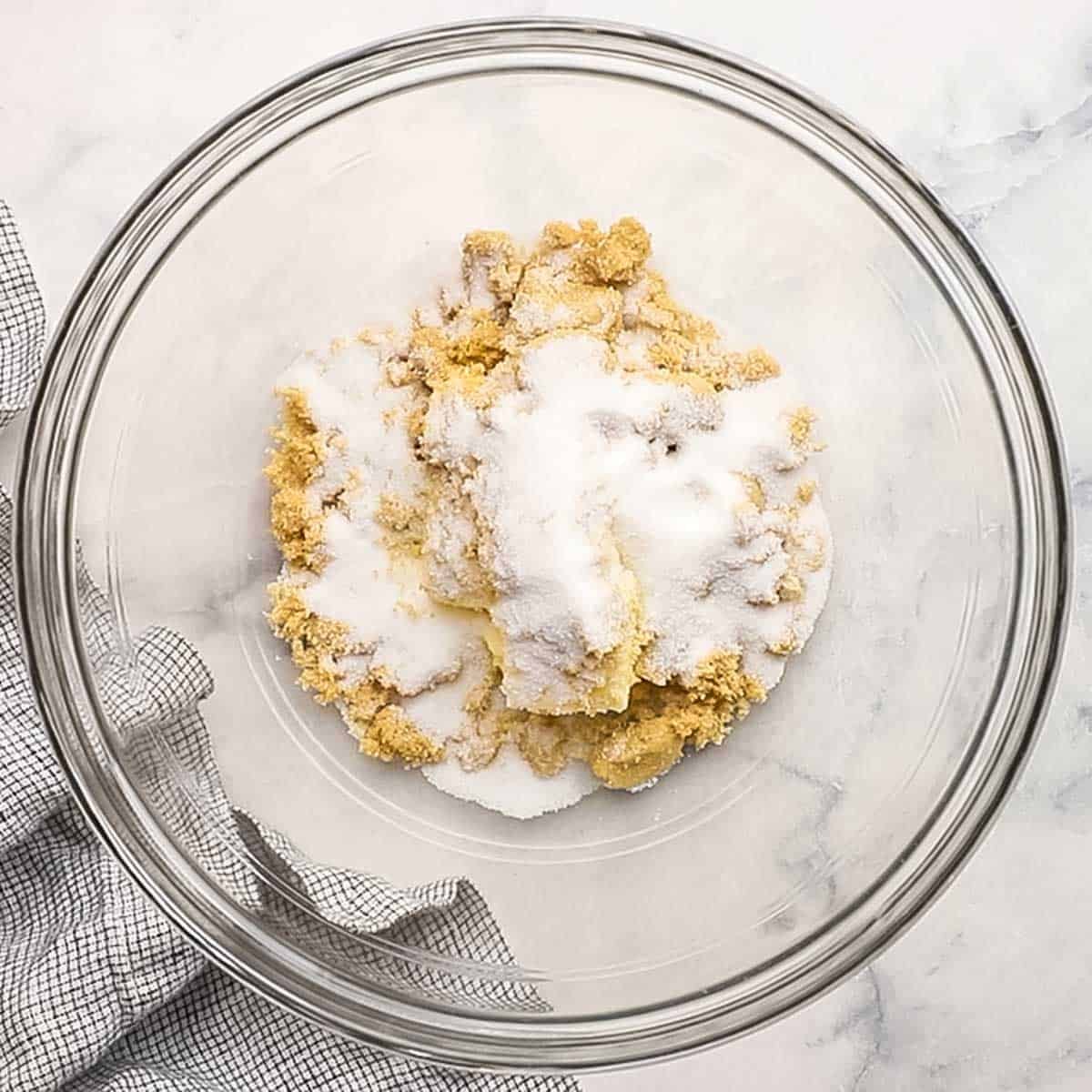 butter and sugars in a bowl