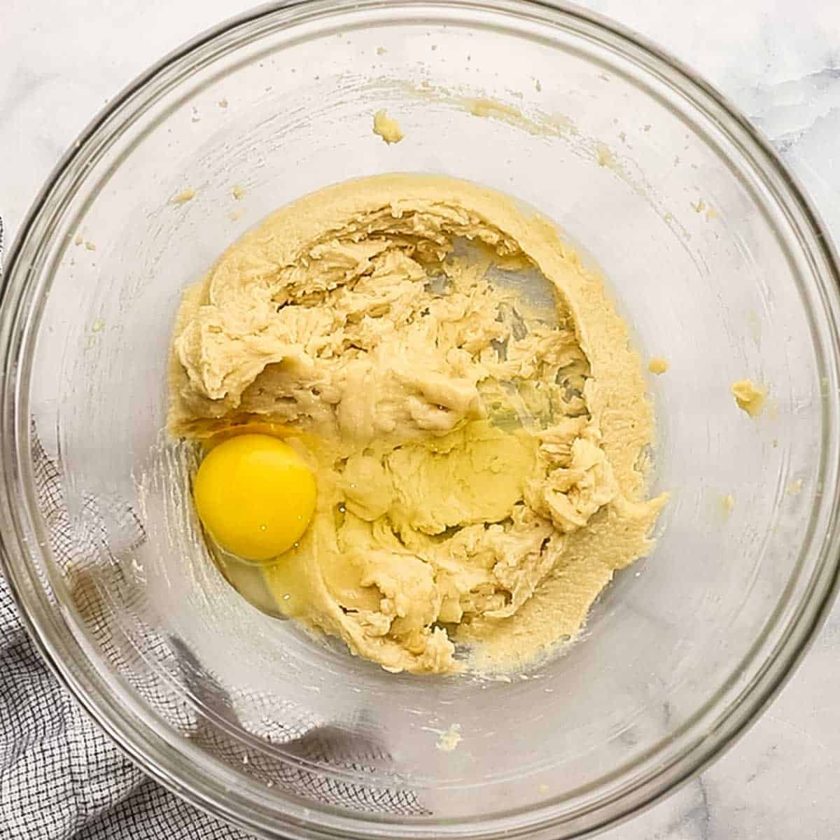 egg added to the creamed butter and sugar