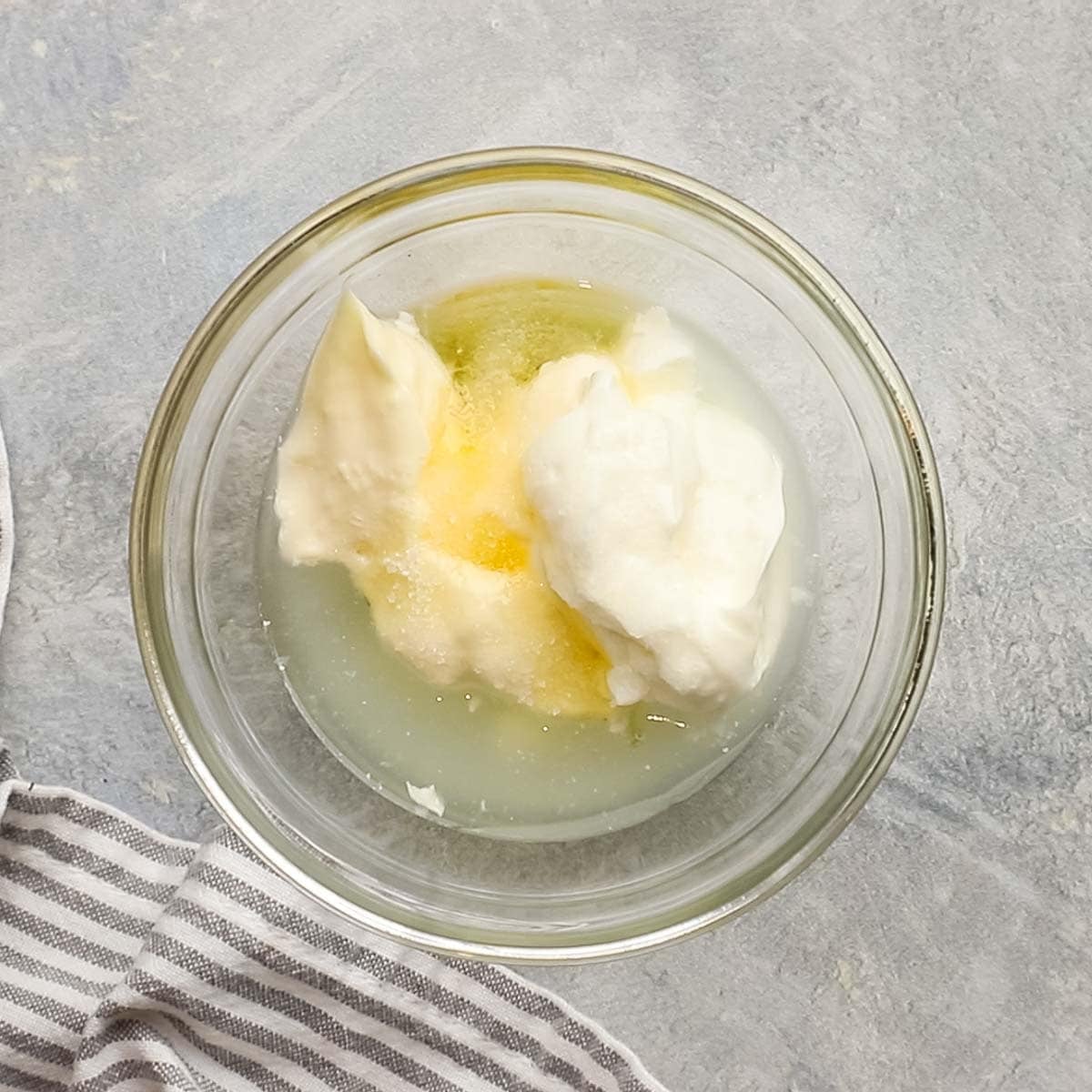 slaw dressing ingredients in a bowl