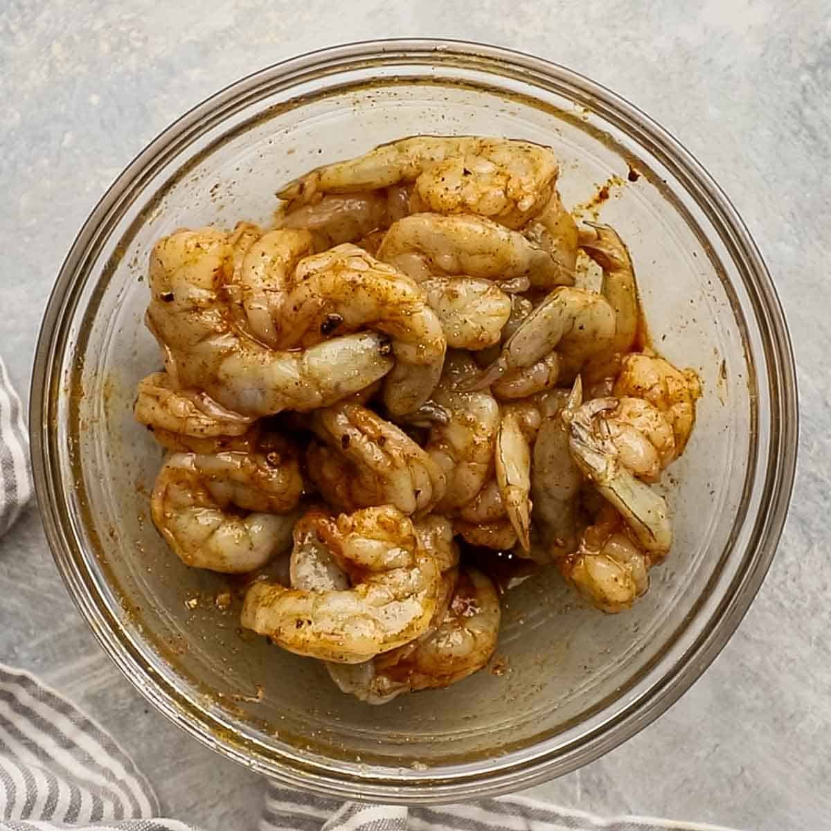 shrimp with seasonings in a bowl
