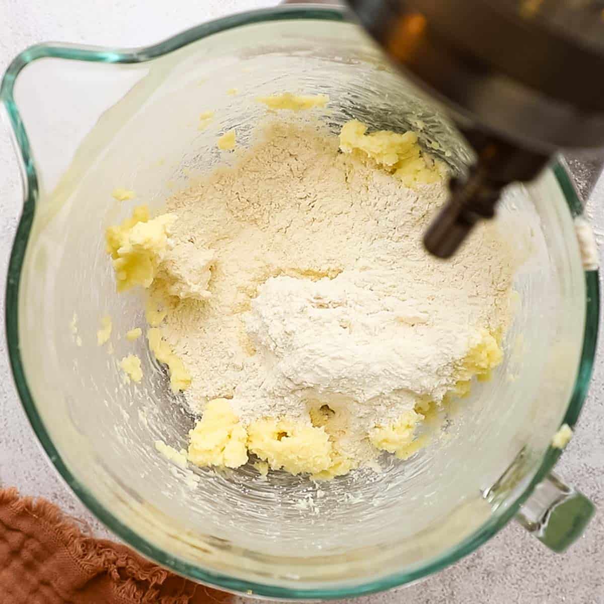 dry ingredients added to the cheese and butter