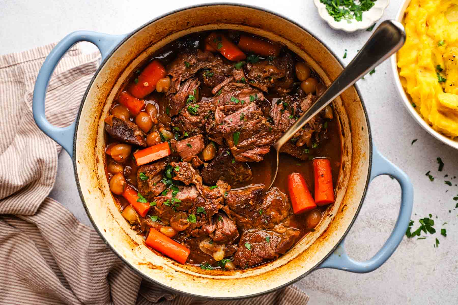overhead view of a pot of braised beef